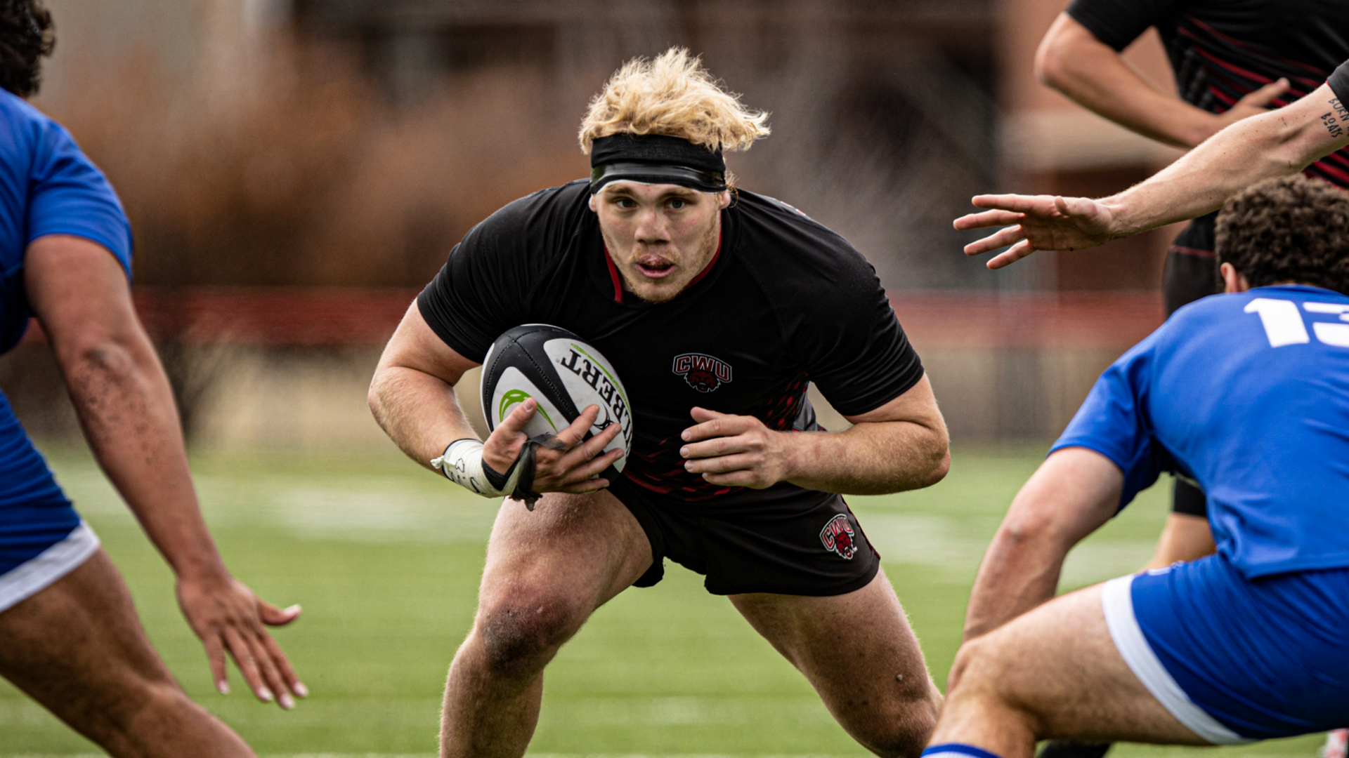 Rugby player running with the ball